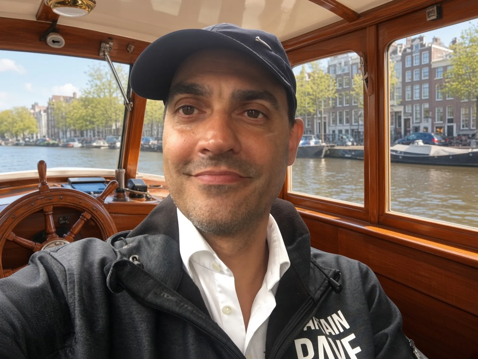 Captain Dave at the wheel of the canal boat